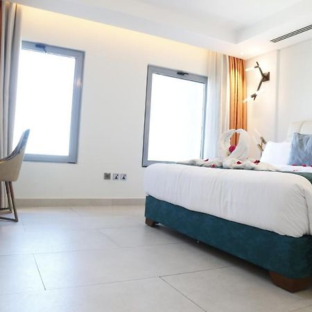 Waterfront Hotel Apartment Lusail Exteriér fotografie A room at the hotel