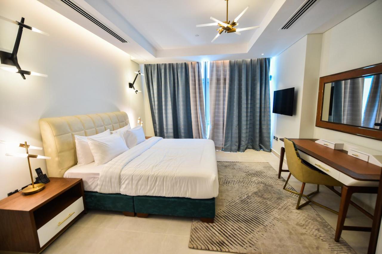 Waterfront Hotel Apartment Lusail Exteriér fotografie A bedroom at the hotel